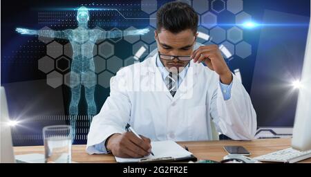 Composition of male doctor over screen with human brain and medical ...