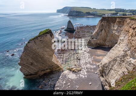 View over Freshwater Bay looking towards Tennyson Down at low tide - Isle of Wight UK Stock Photo