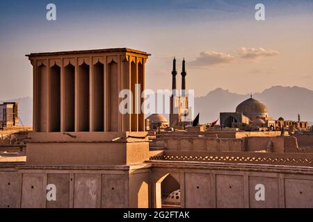 View of the roofs and skyline of Yazd with the badgirs, windcatchers, Yazd, Iran. Stock Photo