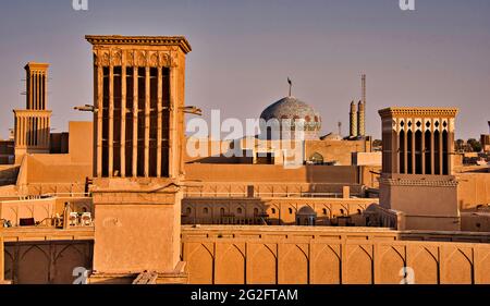 View of the roofs and skyline of Yazd with the badgirs, windcatchers, Yazd, Iran. Stock Photo