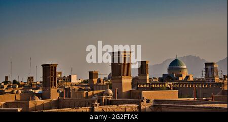 View of the roofs and skyline of Yazd with the badgirs, windcatchers, Yazd, Iran. Stock Photo