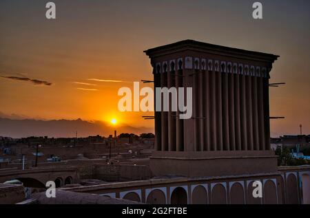 View of the roofs and skyline of Yazd with the badgirs, windcatchers, Yazd, Iran. Stock Photo