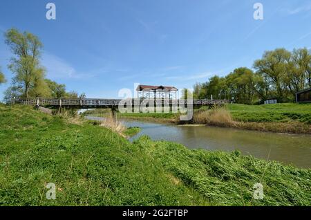 Austria, the rebuilt historical bridge of Andau - destroyed by Soviets - where the refugees from Hungary fled to Austria in 1956 from the Hungarian re Stock Photo