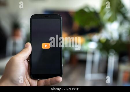 Youtube app opening on a phone screen Stock Photo