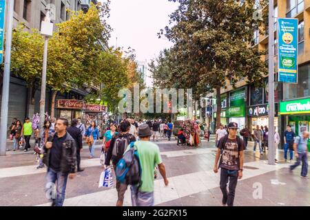 SANTIAGO, CHILE - MARCH 27, 2015: People walk in an alley in the center of Santiago, Chile Stock Photo