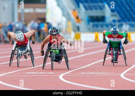 Raymond Martin from the USA (center) wins the Gold medal in the Men's 100m T52 Final with 17.01 during the 2015 Toronto Parapan Am Games Stock Photo