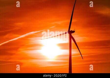 ind turbine in the evening sky Stock Photo