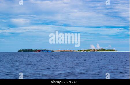 View of Villingillivaru island and Biyaadhoo or Biyadhoo- a circular ten-acre resort-island in South Malé Atoll,Kaafu Atoll ,Maldives.May 2021 Stock Photo