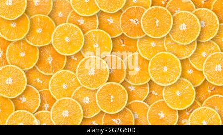 Organic orange fruit slices natural juicy background. Stock Photo