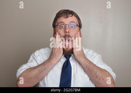 this business man is surprised about something Stock Photo