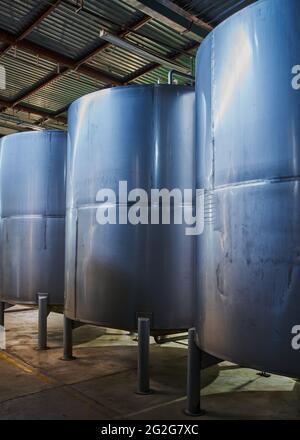 Stainless steel storage tanks to store tequila and other spirits Stock Photo