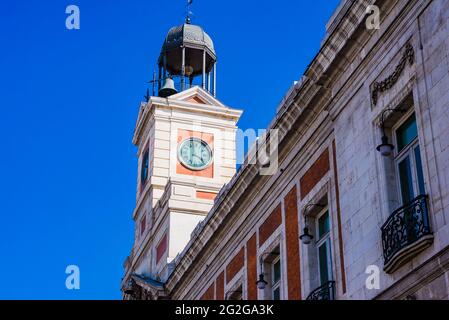 Clock tower inaugurated in 1866 by Queen Isabel II. Its time ball and bells traditionally mark the eating of the Twelve Grapes and the beginning of a Stock Photo