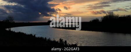 Sunset over the river Welland near Crowland town, Lincolnshire; England, UK Stock Photo