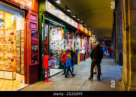 Shops in the arcades of the Plaza Mayor. The Plaza Mayor, Main Square, is a major public space in the heart of Madrid, the capital of Spain. It was on Stock Photo