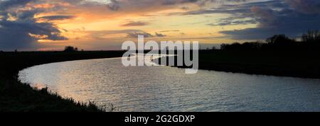 Sunset over the river Welland near Crowland town, Lincolnshire; England, UK Stock Photo