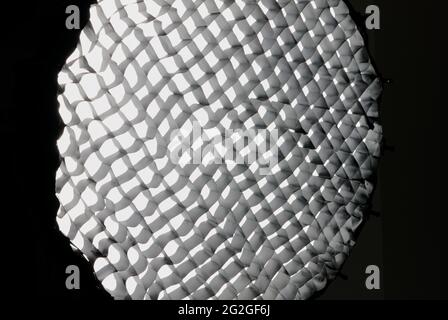 softbox equipment with honeycombs in studio close-up on a black background Stock Photo