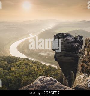 Sunrise view from Lilienstein into the Elbe Valley in the Elbe Sandstone Mountains. Stock Photo