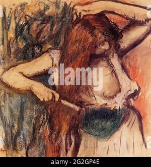 Edgar Degas -  Woman Combing Her Hair 2 C 1894 Stock Photo
