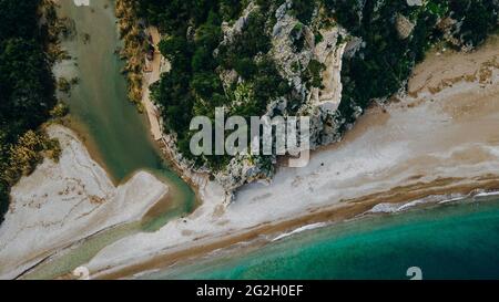 CHIRALI, TURKEY: aerial view Sunny beach resort in Turkey with stunning views of the mountains. Stock Photo