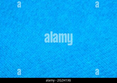 Grainy detailed blue paper texture and grunge surface background close-up photo Stock Photo