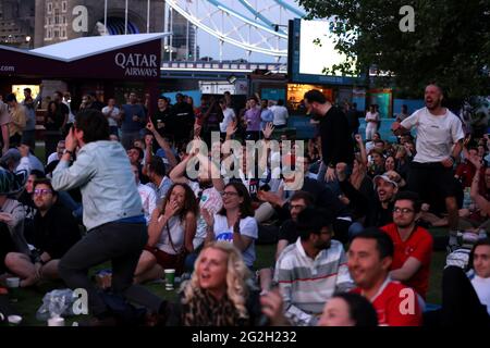 Fans at Potters Fields Park as they watch the UEFA Euro 2020 Group A opening match between Turkey and Italy held at the Stadio Olimpico, Italy. Picture date: Friday June 11, 2021. Stock Photo