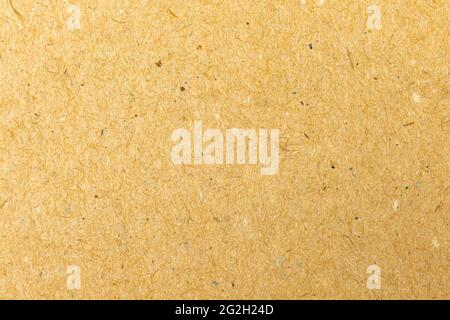 Old brown recycle craft paper texture background, cardboard surface close-up Stock Photo