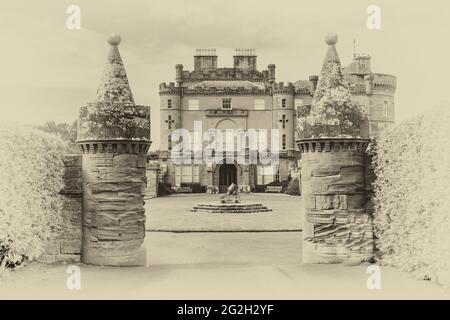 Scotland. Culzean Castle in monochrome as seen from the clock tower, coach house and horse stables buildings Stock Photo