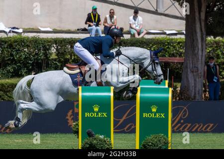 Martin Fuchs (SUI) ride CLOONEY during the Rolex Grand Prix Rome at 88th CSIO 5° Master D'Inzeo at Piazza di Siena on May 30, 2021 in Rome, Italy. Stock Photo