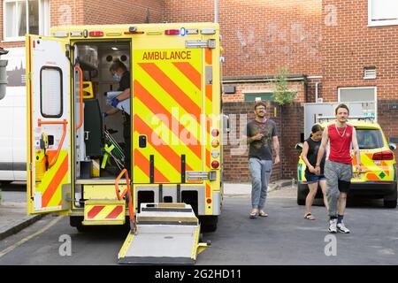 Medical staff attended casualty , got into rear door of London Ambulance, London, England UK Stock Photo