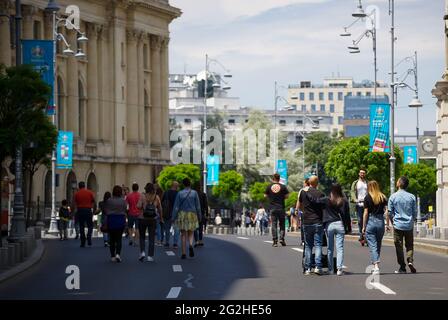 Bucharest, Romania - June 08, 2021: People are walking on Calea Victoriei. Several streets in the center of Bucharest are closed to car traffic and op Stock Photo