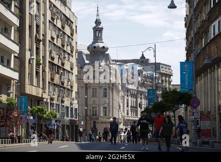 Bucharest, Romania - June 08, 2021: People are walking on Calea Victoriei. Several streets in the center of Bucharest are closed to car traffic and op Stock Photo