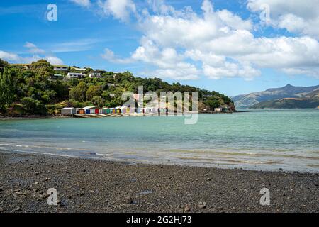 Boathouses in Duvauchelle, Banks Peninsula, East Coast of the South Island, Canterbury Region, New Zealand Stock Photo