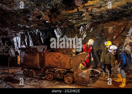 In the former tin mine on the Sauberg near Ehrenfriedersdorf, visitors can experience the 750-year history of tin and silver mining at a depth of 100 meters up close Stock Photo