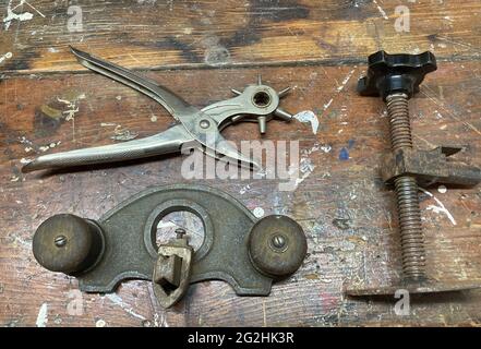 assorted tools on wooden work bench Stock Photo