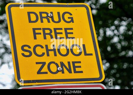 'Drug Free School Zone' sign on the grounds of a school. Stock Photo