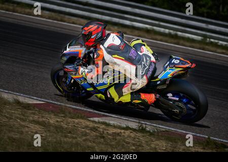 11-05-2020 Kaunas, Lithuania Motorcyclist at sport bike rides by empty asphalt road. sport bike. MotoGP race. Superbikes. Motorbikes racing. Stock Photo