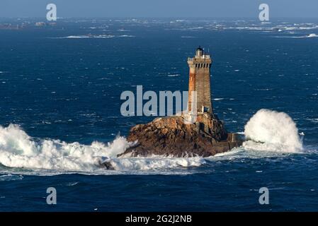 Lighthouse La Vieille in the sea in front of the Pointe du Raz, France, Brittany, Finistère department Stock Photo