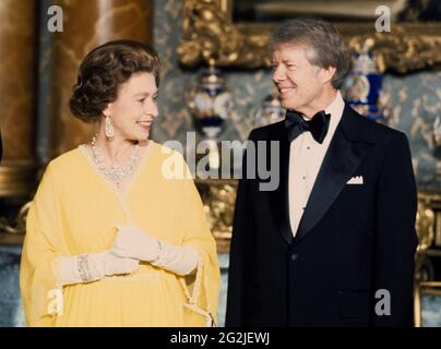 File photo dated 07/05/77 of Queen Elizabeth II with the then US President Jimmy Carter at a State Dinner at Buckingham Palace in London. Issue date: Saturday June 12, 2021. Stock Photo