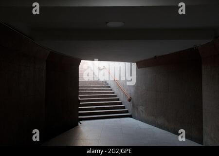 Underground pedestrian crossing. View from stairs exiting from a tunnel. Way out Stock Photo
