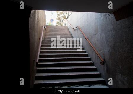 Underground pedestrian crossing. View from stairs exiting from a tunnel. Way out Stock Photo