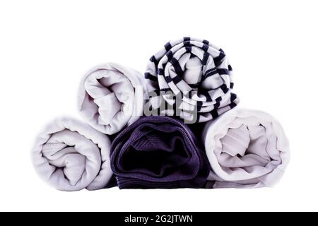 Clothes roll storage. Close-up. Isolated on white. Stock Photo