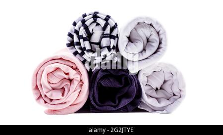 Clothes roll storage. Close-up. Isolated on white. Stock Photo