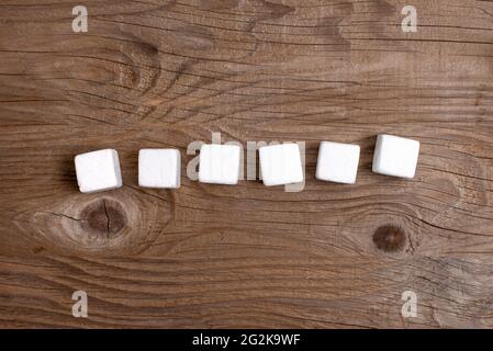 Stack of Sample Cube Rectangular Boxes On Surface Polished With Multi-Colour Stock Photo