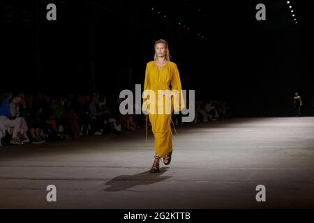 A model walks the runway during the KITX show during the Afterpay Australian Fashion Week Resort 2022 Collections at Carriageworks on June 2, 2021 in Stock Photo