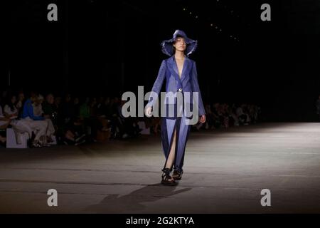 A model walks the runway during the KITX show during the Afterpay Australian Fashion Week Resort 2022 Collections at Carriageworks on June 2, 2021 in Stock Photo