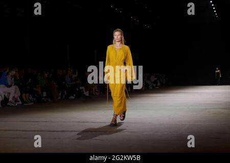 A model walks the runway during the KITX show during the Afterpay Australian Fashion Week Resort 2022 Collections at Carriageworks on June 2, 2021 in Stock Photo