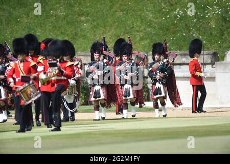 Members of the Massed Band of the Household Division during a ceremony at Windsor Castle in Berkshire to mark her official birthday. Picture date: Saturday June 12, 2021. Stock Photo