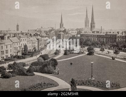 A late 19th century view of  the three spires rising over the City of Coventry in Warwickshire, England. Situated on the River Sherbourne, Coventry has been a large settlement for centuries, although it was not founded and given its city status until the Middle Ages. Stock Photo