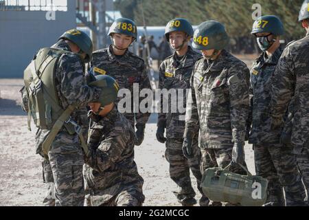 June 11, 2021-Pohang, South Korea-In this photos taken date is April 12, 2019. South Korean Marine trainees take part in an military basic boot training at Marine boot camp in Pohang, South Korea. The Republic of Korea Marine Corps also known as the ROK Marine Corps or the ROK Marines, is the marine corps of South Korea. The ROKMC is a branch of the Republic of Korea Navy responsible for amphibious operations and also functions as a rapid reaction force and a strategic reserve. The ROKMC was founded as a suppression operations force against communist partisans in 1949, prior to the Korean War. Stock Photo