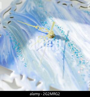 Wall clock made of resin art.  Epoxy art Stock Photo